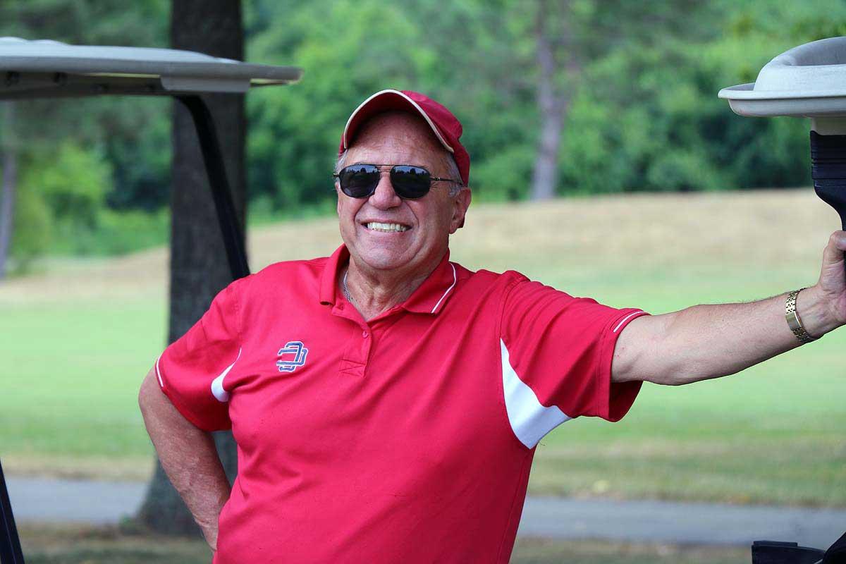 David DeFillippo looking out on golf course.